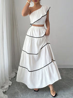 Laura - Set Asimétrico de Top con Volantes y Falda