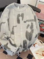 Zian - El Suéter de Punto Oversized con Dobladillo Desgastado